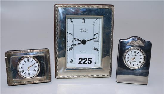 3 silver desk clocks